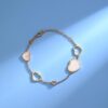 6930074f12f62673a6fab3fa Chopard-style Heart Bracelet with Symbolic Design - Interconnected Hearts