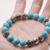 693007c012f62673a6fab4b1 Chrome Hearts Turquoise Bracelet with Full Bead Cross Design