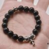 693007c612f62673a6fab4b7 Chrome Hearts Obsidian Bracelet with Cross and Ball Detail