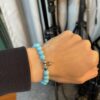 693007cd12f62673a6fab4c2 Chrome Hearts Turquoise Bracelet with Crossflower Detail