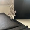 693007e912f62673a6fab4ea Essential for Fashion-Forward Individuals: Double Cross Silver Necklace, Polished and Diamond-Faced, Reversible and Detachable Design