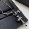 693007e912f62673a6fab4eb Essential for Fashion-Forward Individuals: Double Cross Silver Necklace, Polished and Diamond-Faced, Reversible and Detachable Design