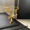 693007ed12f62673a6fab4f1 Punk Essential: Cross Pin Necklace by Chrome Hearts