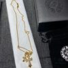 693007ed12f62673a6fab4f2 Punk Essential: Cross Pin Necklace by Chrome Hearts