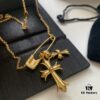 693007f012f62673a6fab4f6 Punk Essential: Cross Pin Necklace by Chrome Hearts