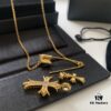693007f112f62673a6fab4f8 Punk Essential: Cross Pin Necklace by Chrome Hearts