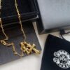 693007f412f62673a6fab4fd Kuroshin Trendy Essential Item: Double Cross Gold Necklace with Diamond and Polished Surfaces, Reversible and Detachable Design