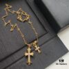 693007f812f62673a6fab503 Kuroshin Trendy Essential Item: Double Cross Gold Necklace with Diamond and Polished Surfaces, Reversible and Detachable Design