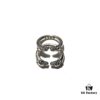 693008ce12f62673a6fab699 Chrome Hearts Double Dragon Dog Head Ring with Adjustable Open Design and Embossed Lettering Details