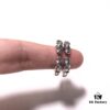 693008cf12f62673a6fab69c Chrome Hearts Double Dragon Dog Head Ring with Adjustable Open Design and Embossed Lettering Details