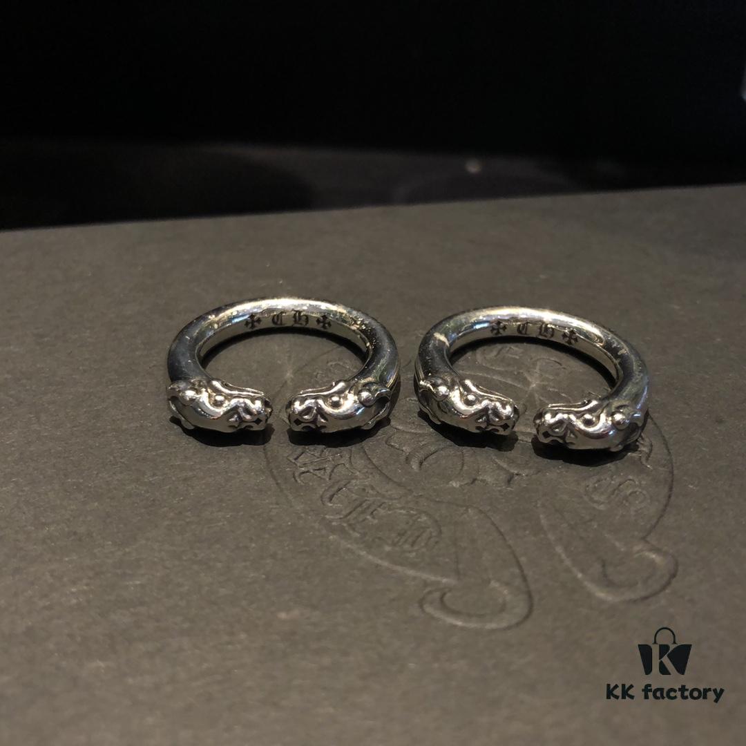 693008d012f62673a6fab69e Chrome Hearts Double Dragon Dog Head Ring with Adjustable Open Design and Embossed Lettering Details
