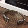 693008e012f62673a6fab6c6 Chrome Hearts Wide Open Bangle Bracelet with Vintage Gothic Cross Design