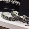693008e312f62673a6fab6ce Chrome Hearts Wide Open Bangle Bracelet with Vintage Gothic Cross Design