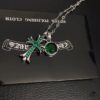 693009cf12f62673a6fab8a2 Today's Recommendation: Chrome Hearts Vintage Green Diamond Cross Necklace