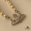 69300ce512f62673a6fabe6e Vivienne Westwood Pearl Planet Necklace