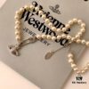 69300ce612f62673a6fabe71 Vivienne Westwood Pearl Pin Necklace