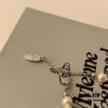 69300ce712f62673a6fabe75 Vivienne Westwood Pearl Planet Necklace