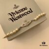69300ce912f62673a6fabe7a Vivienne Westwood Pearl Planet Bracelet