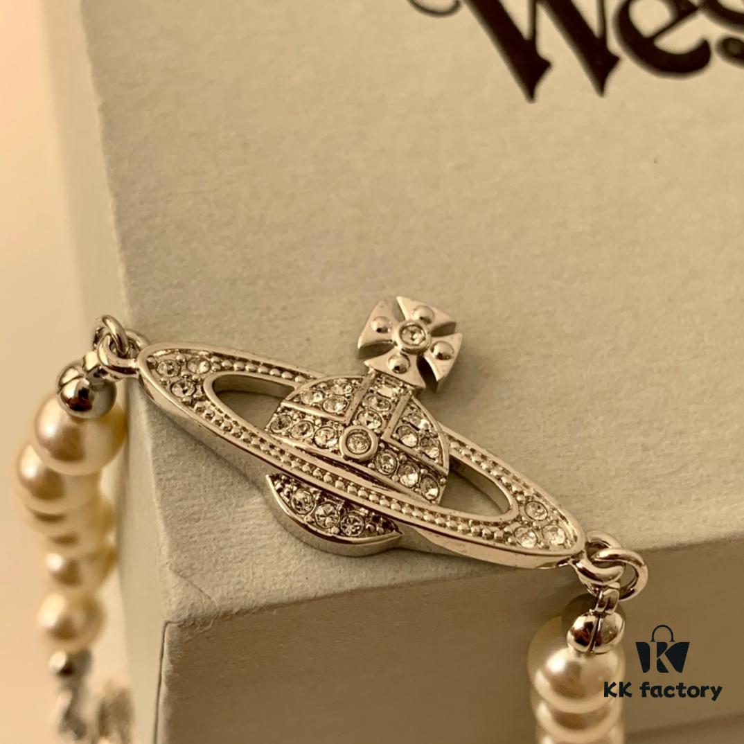 69300ce912f62673a6fabe7c Vivienne Westwood Pearl Planet Bracelet