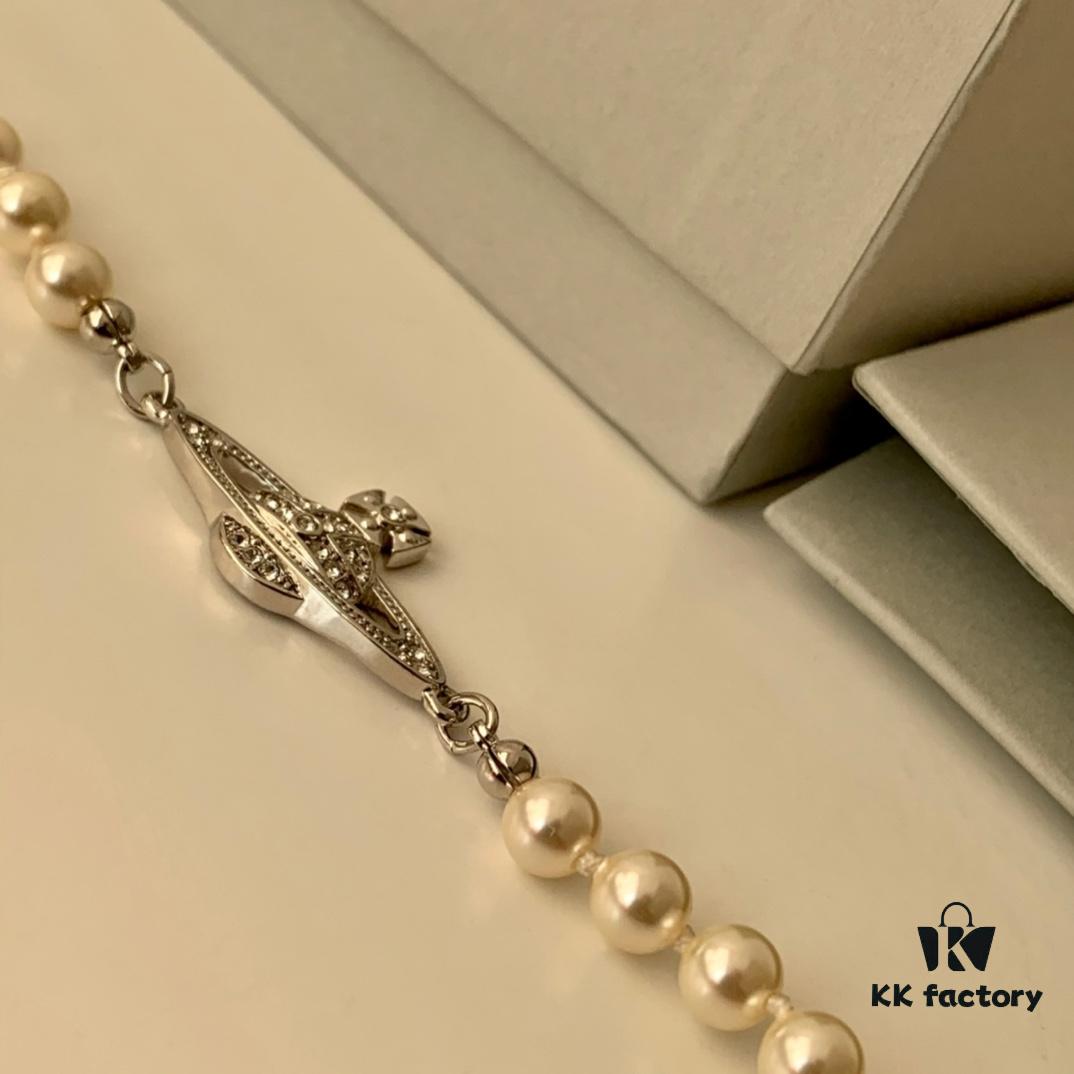 69300cee12f62673a6fabe89 Vivienne Westwood Pearl Planet Bracelet