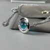 69300d3312f62673a6fabf07 Vivienne Westwood Saturn Necklace in Silver and Blue with Gradient Small Diamonds