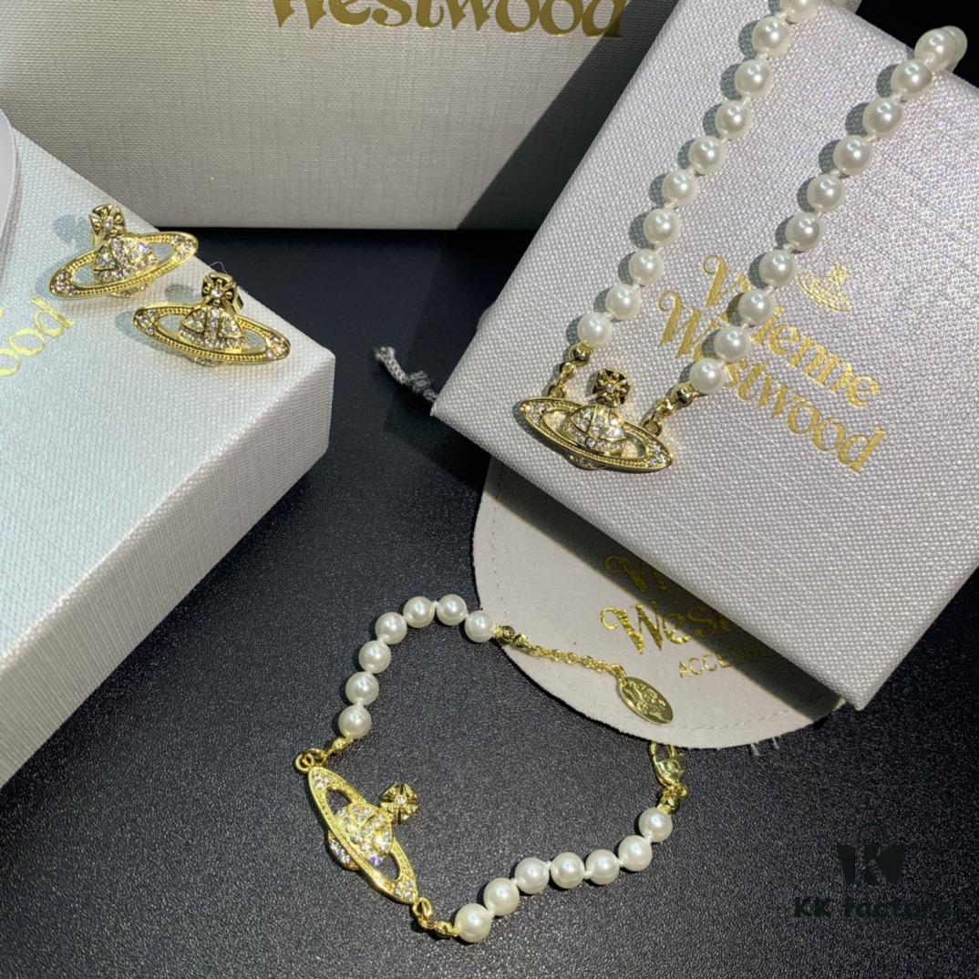 69300d3312f62673a6fabf08 Vivienne Westwood Saturn Pearl Necklace - Bracelet - Earrings