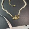 69300d3712f62673a6fabf0c Vivienne Westwood Saturn Pearl Necklace - Bracelet - Earrings