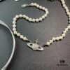 69300d3812f62673a6fabf0e Vivienne Westwood Saturn Pearl Necklace - Bracelet - Earrings