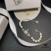69300d3912f62673a6fabf0f Vivienne Westwood Saturn Pearl Necklace - Bracelet - Earrings