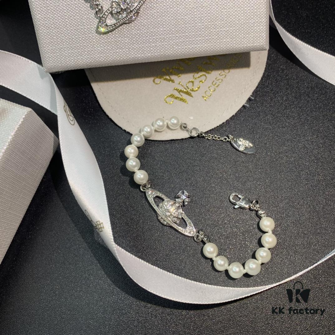 69300d3912f62673a6fabf0f Vivienne Westwood Saturn Pearl Necklace - Bracelet - Earrings