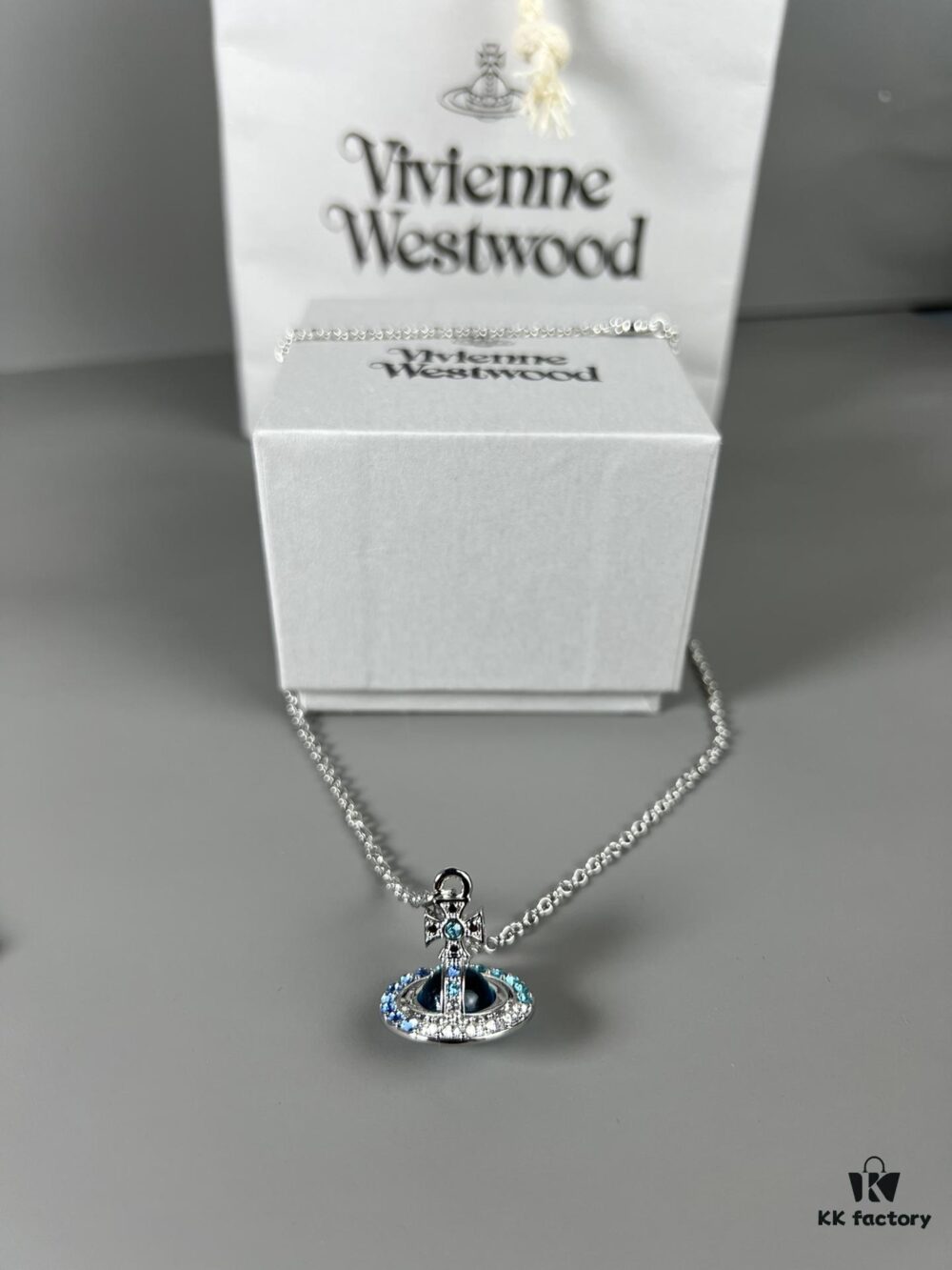 69300d3c12f62673a6fabf15 Vivienne Westwood Saturn Necklace in Silver and Blue with Gradient Small Diamonds