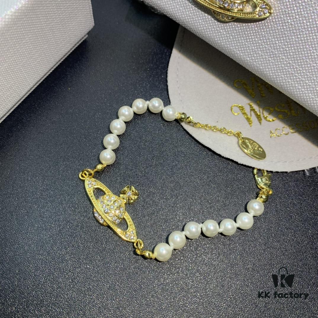 69300d3f12f62673a6fabf18 Vivienne Westwood Saturn Pearl Necklace - Bracelet - Earrings