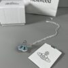 69300d4d12f62673a6fabf3a Vivienne Westwood Saturn Necklace in Silver and Blue with Gradient Small Diamonds