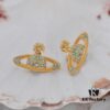 69300d7f12f62673a6fabf9e Vivienne Westwood Classic Full-Pavé Diamond Stud Earrings - Gold and Blue Diamonds