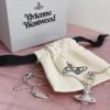 69300d9012f62673a6fabfb9 Vivian New Arrival Pin Saturn Necklace, Perfect for Showcasing the Neckline