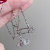 69300d9112f62673a6fabfba Vivian New Arrival Pin Saturn Necklace, Perfect for Showcasing the Neckline
