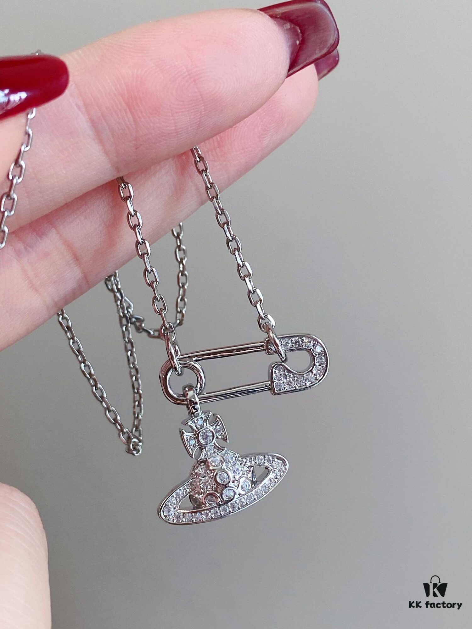 69300d9112f62673a6fabfba Vivian New Arrival Pin Saturn Necklace, Perfect for Showcasing the Neckline
