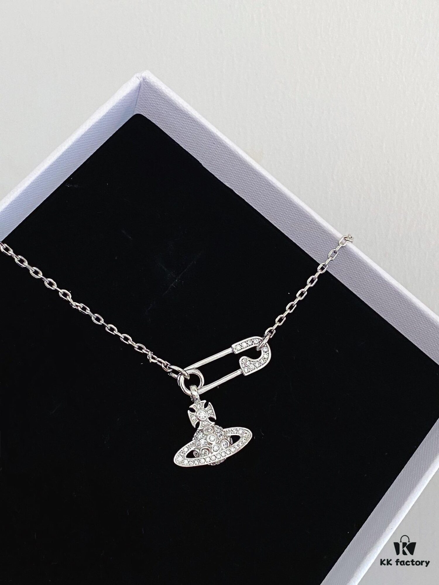 69300d9112f62673a6fabfbb Vivian New Arrival Pin Saturn Necklace, Perfect for Showcasing the Neckline