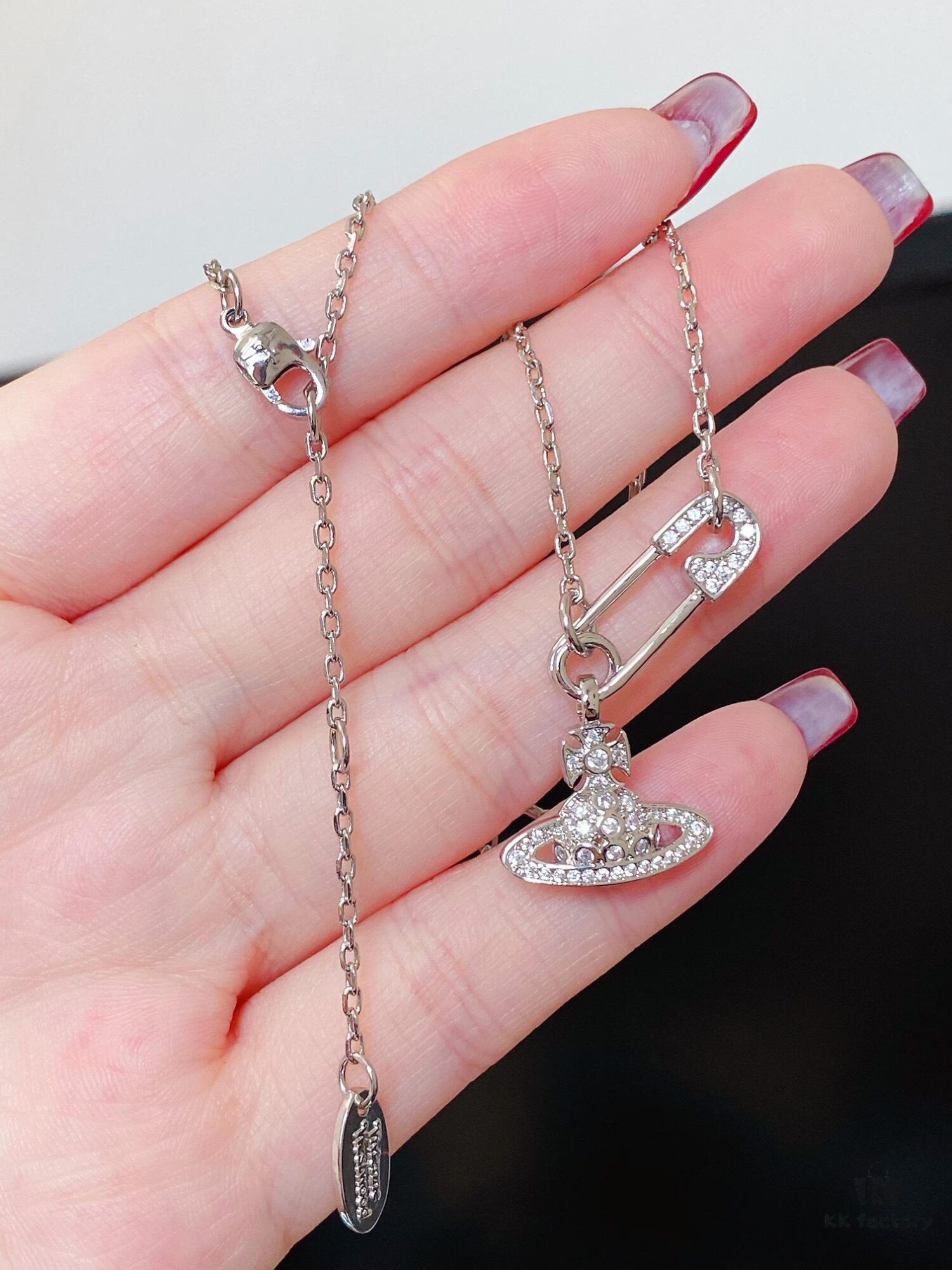 69300d9112f62673a6fabfbc Vivian New Arrival Pin Saturn Necklace, Perfect for Showcasing the Neckline