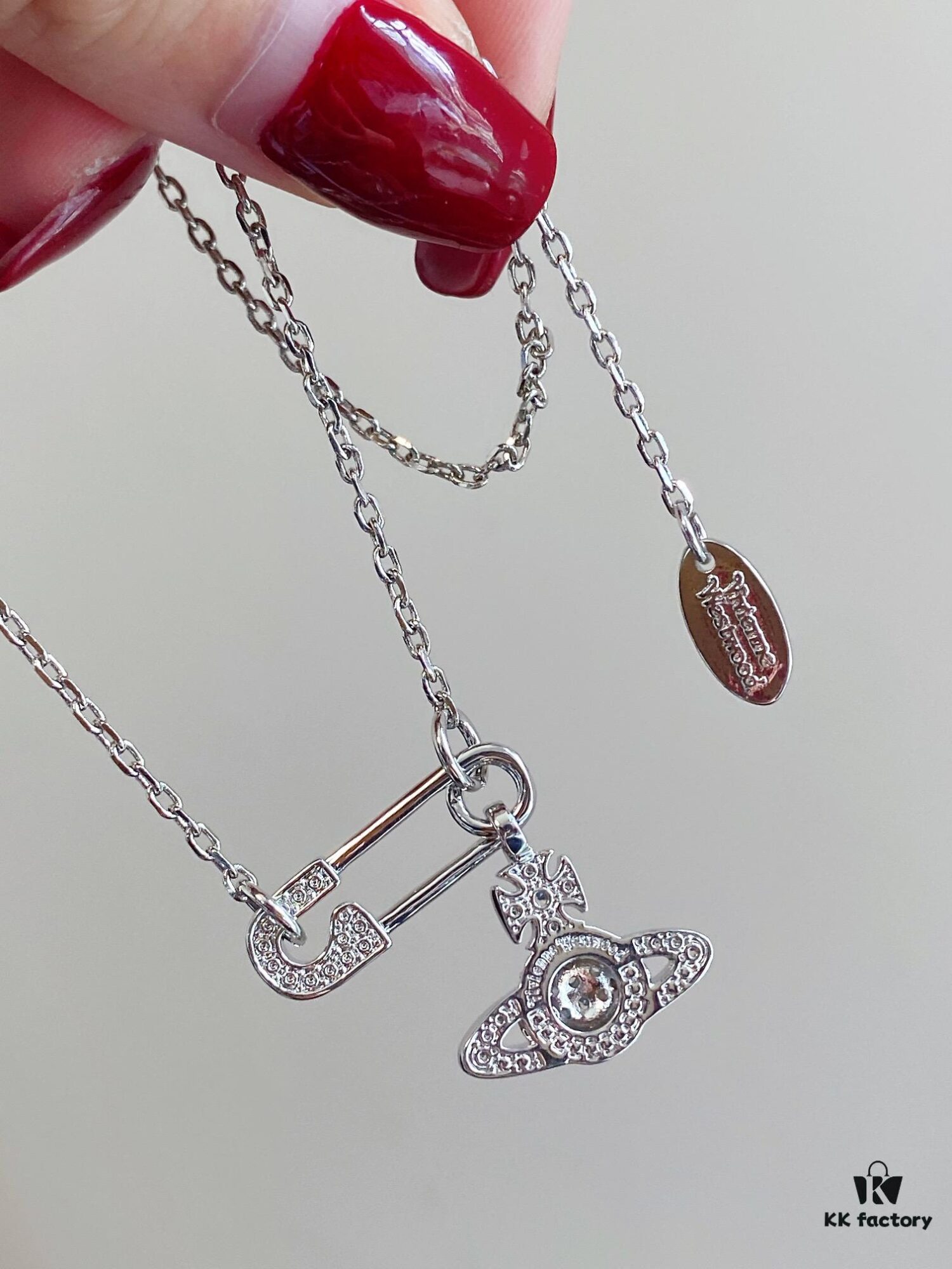 69300d9e12f62673a6fabfce Vivian New Arrival Pin Saturn Necklace, Perfect for Showcasing the Neckline