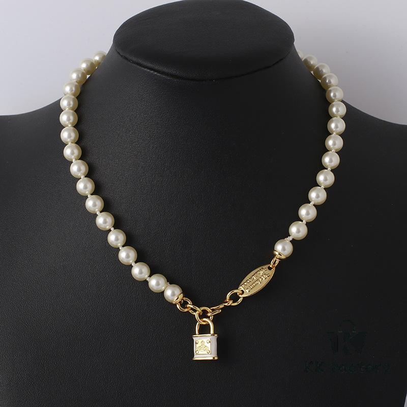 69300da012f62673a6fabfd2 Wholesale European and American Fashion Jewelry Saturn Pearl and Enamel 3D Small Lock Necklace for Women, Drop Shipping Available