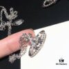 69300db112f62673a6fabfe6 Vivienne Westwood Saturn Planet Set Crown Earrings and Necklace, Celebrity Style, Custom Diamond-Inlaid Saturn Design, Fashion Trendsetter