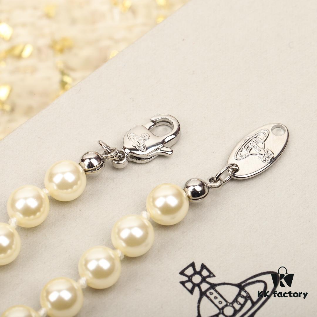69300e3c12f62673a6fac079 Vivienne Westwood Saturn Pearl Set - A Timeless Fusion of Punk and Elegance