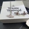 69300e9512f62673a6fac113 Lady Vengeance Pink Diamond Saturn Necklace and Stud Earrings Set In Stock