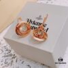 69300ea912f62673a6fac138 Vivienne Westwood Saturn Earrings and Necklace