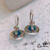 69300ead12f62673a6fac141 Vivienne Westwood Saturn Earrings Necklace