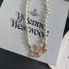69300ec112f62673a6fac160 West Queen Rose Gold Saturn Pearl Necklace