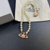 69300ec112f62673a6fac162 West Queen Rose Gold Saturn Pearl Necklace