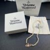 69300ec212f62673a6fac163 West Queen Rose Gold Saturn Pearl Necklace