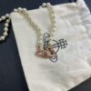 69300ec612f62673a6fac168 West Queen Rose Gold Saturn Pearl Necklace